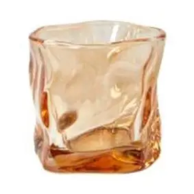 DACORE fyrfadsstage høj - lysebrun - LYSESTAGER